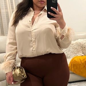 Feather sleeve blouse